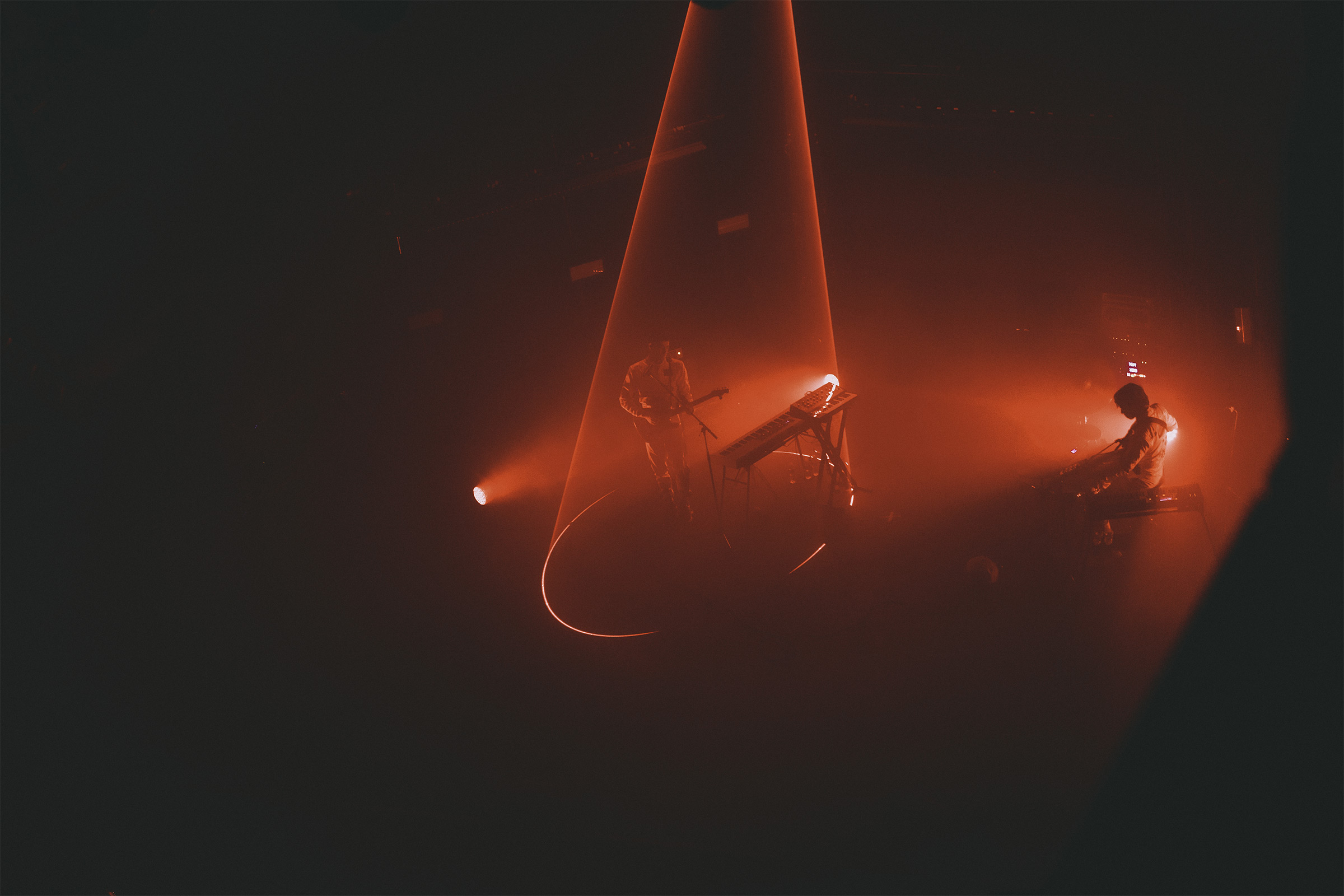 ghostly long exposure of slenderbodies guitarist benji giving a trail behind him